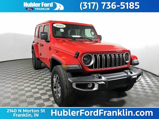 2025 Jeep Wrangler Sahara in Firecracker Red Clearcoat — front three-quarter view