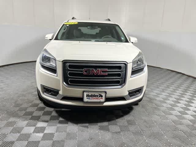 2014 GMC Acadia — rear three-quarter view