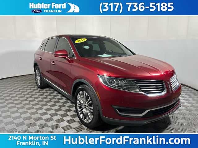2018 Lincoln MKX Reserve in Ruby Red Tinted Clearcoat — front three-quarter view