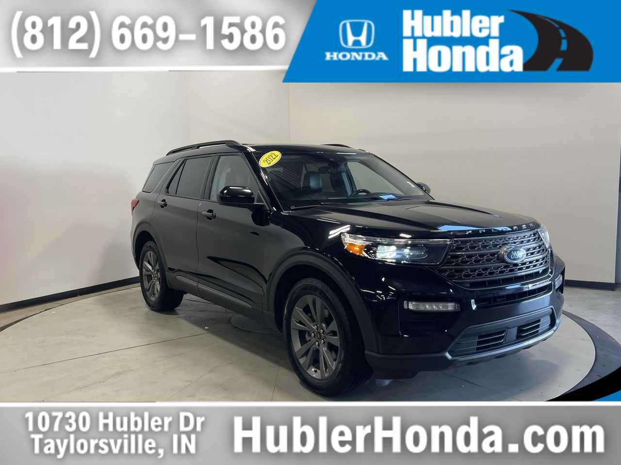 2022 Ford Explorer XLT in Agate Black — front three-quarter view