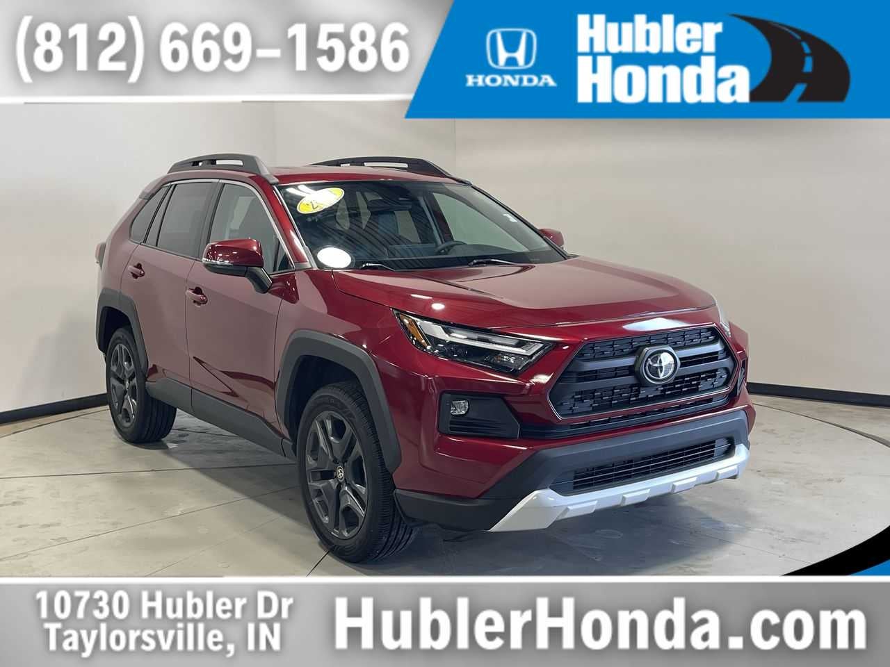 2023 Toyota RAV4 Adventure in Ruby Flare Pearl — front three-quarter view