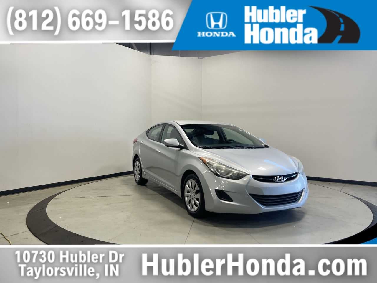 2013 Hyundai Elantra GLS in Radiant Silver — front three-quarter view