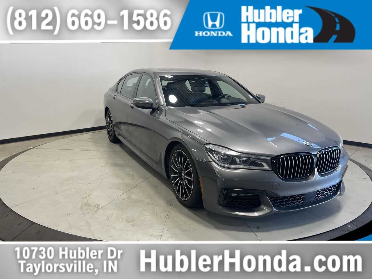 2017 BMW 750i xDrive 750i xDrive in Dark Graphite Metallic — front three-quarter view