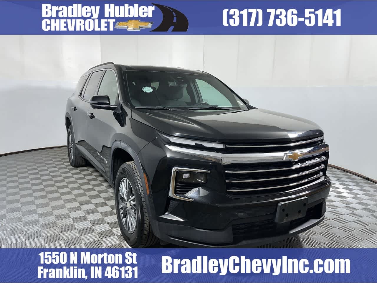 2024 Chevrolet Traverse LT in Mosaic Black Metallic — front three-quarter view