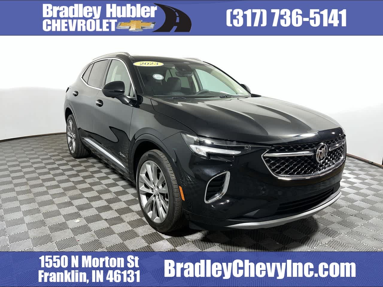 2023 Buick Envision Avenir in Ebony Twilight Metallic — front three-quarter view