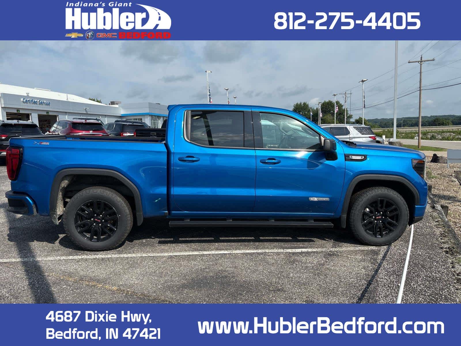 2023 GMC Sierra 1500 Elevation in Dynamic Blue Metallic — front three-quarter view