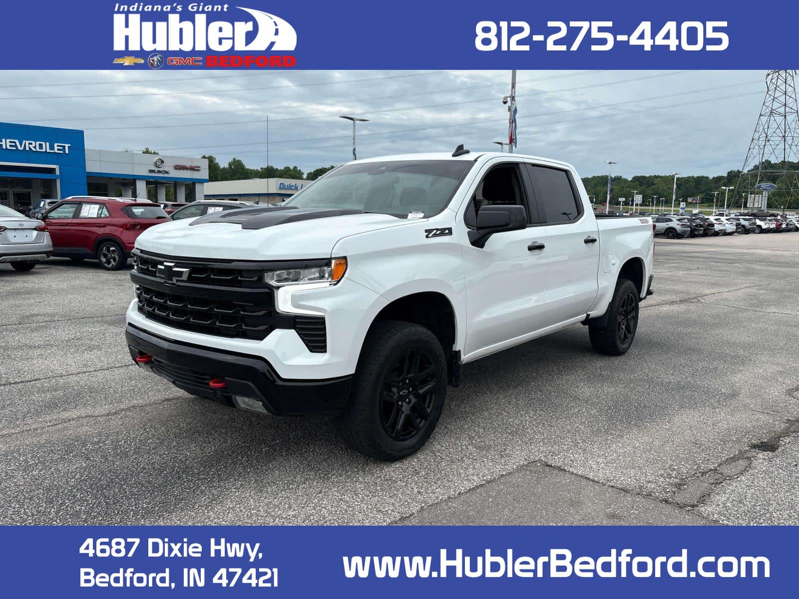 2023 Chevrolet Silverado 1500 LT Trail Boss in Summit White — front three-quarter view