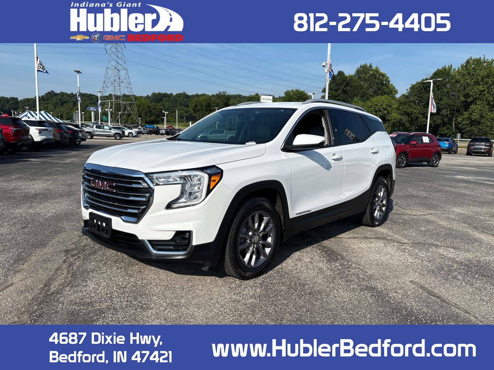 2023 GMC Terrain SLT in Summit White — front three-quarter view