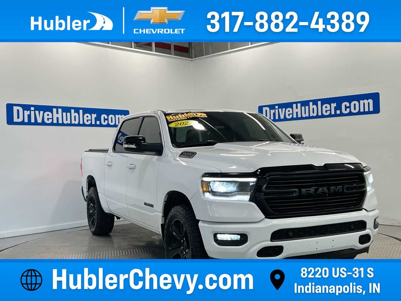 2021 RAM 1500 Big Horn in Ice Cap — front three-quarter view