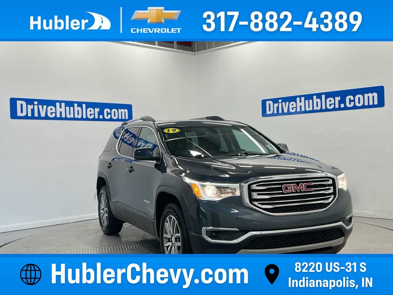 2019 GMC Acadia SLE in Dark Sky Metallic — front three-quarter view