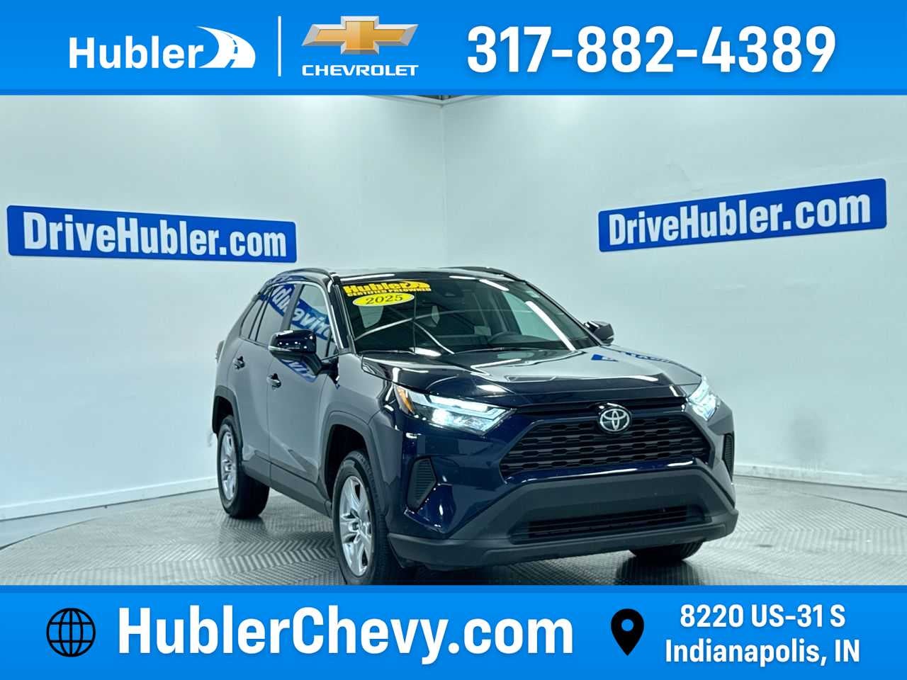 2025 Toyota RAV4 XLE in Blueprint — front three-quarter view