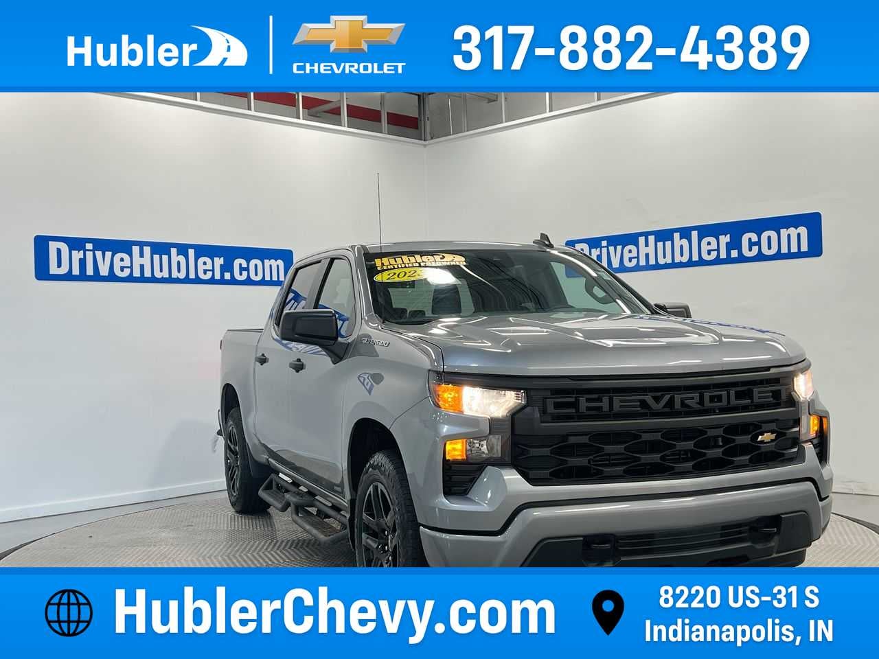 2023 Chevrolet Silverado 1500 Custom in Sterling Gray Metallic — front three-quarter view