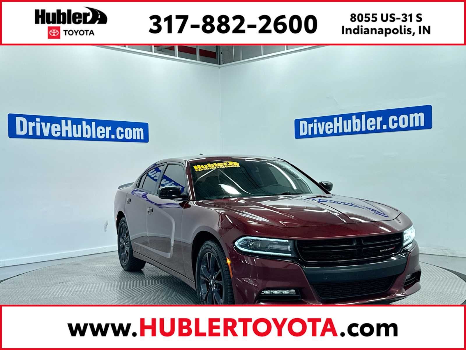 2020 Dodge Charger SXT in Octane Red Pearlcoat — front three-quarter view