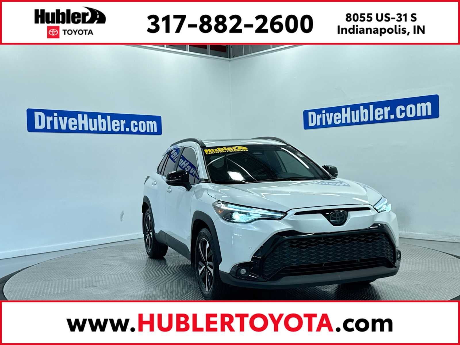 2025 Toyota Corolla Cross Hybrid XSE in Wind Chill Pearl — front three-quarter view