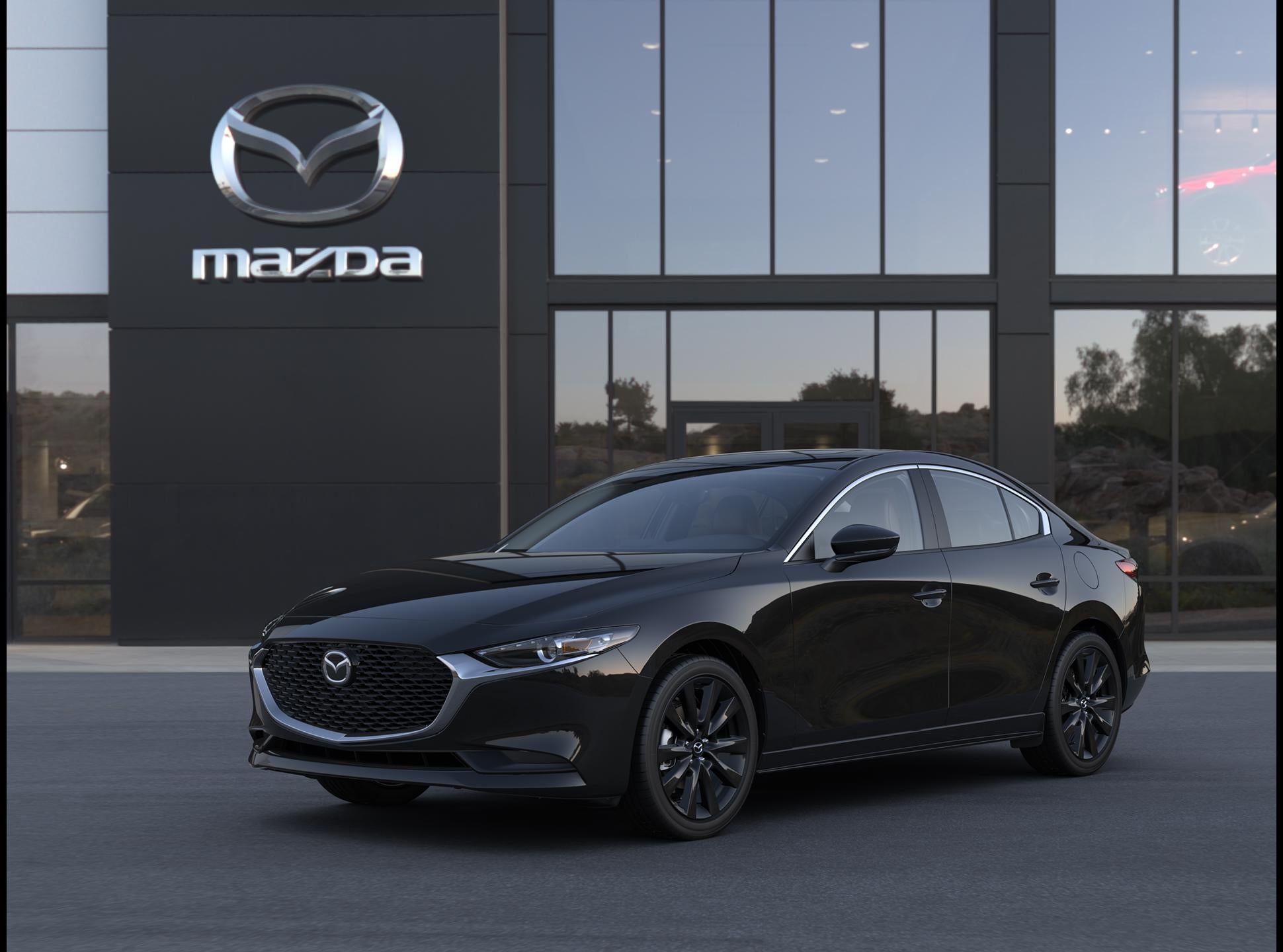 2026 Mazda Mazda3 Sedan 2.5 S Carbon Edition AWD in Jet Black Mica — front three-quarter view