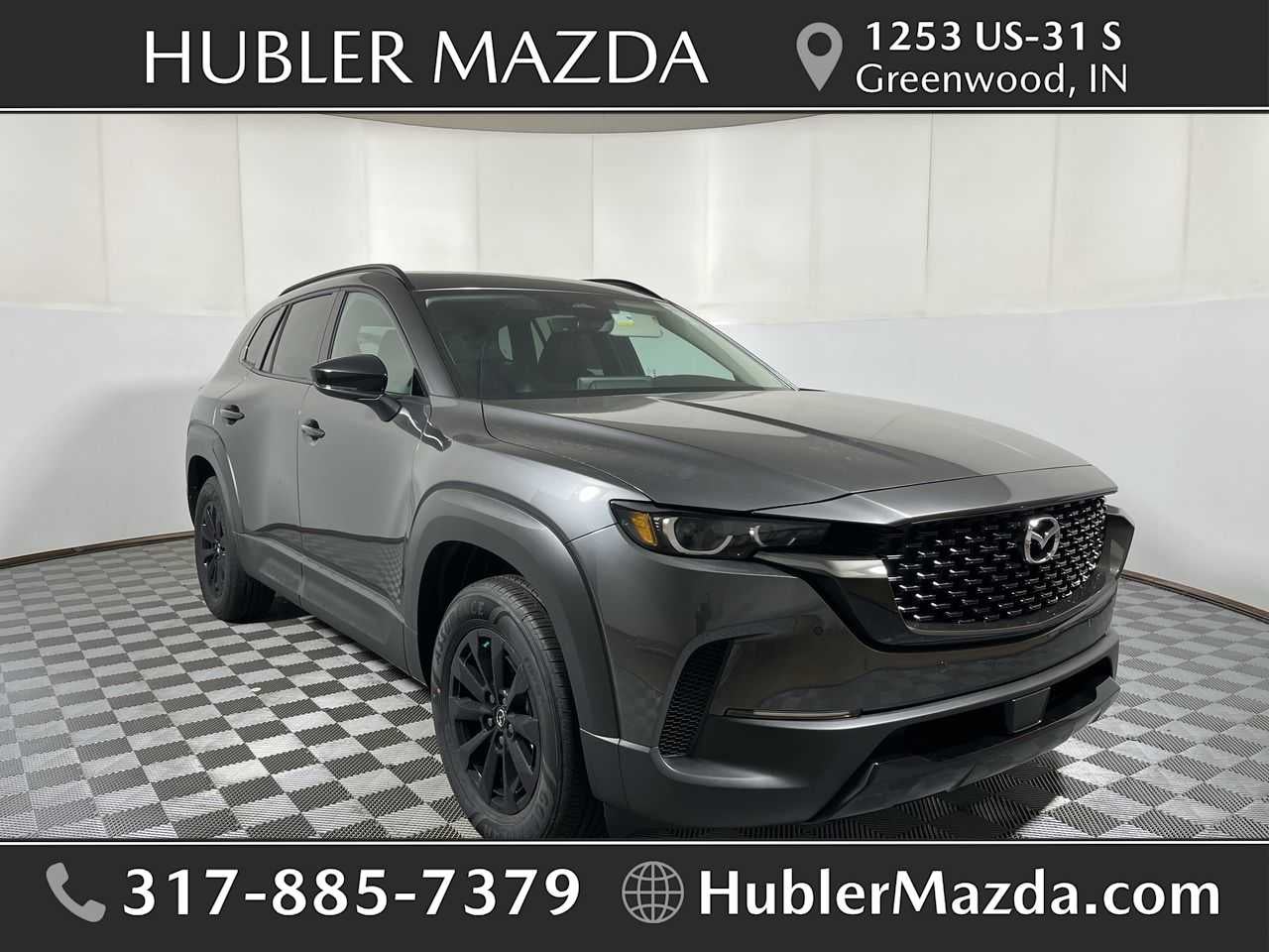2026 Mazda Mazda CX-50 Hybrid Premium AWD in Machine Gray Metallic — front three-quarter view