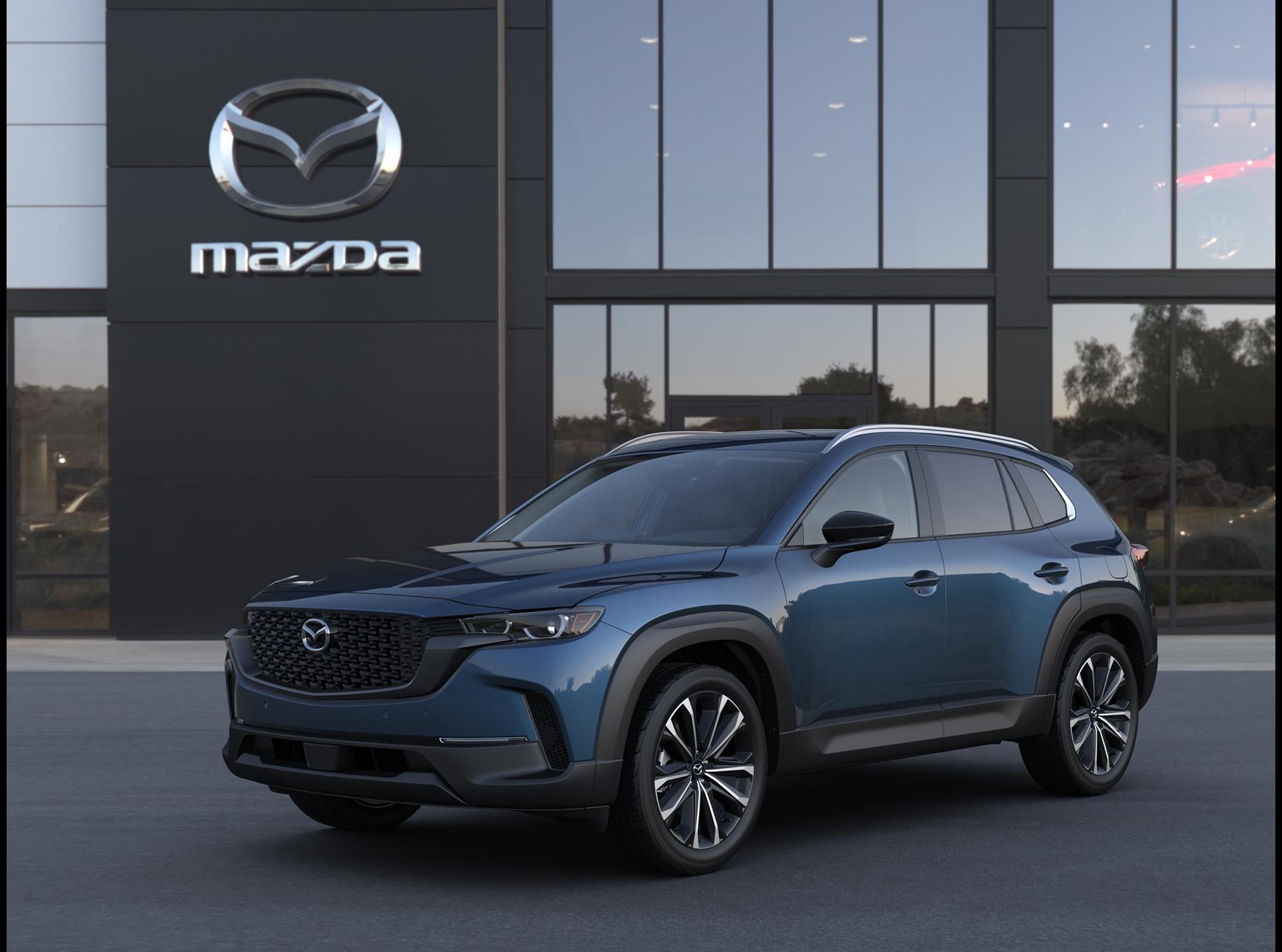2026 Mazda Mazda CX-50 2.5 S Premium AWD in Ingot Blue Metallic — front three-quarter view