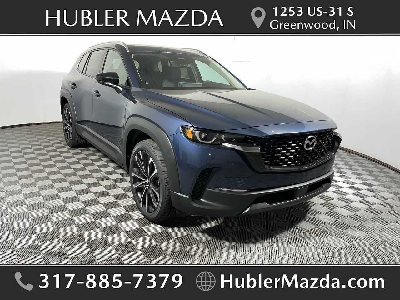 2026 Mazda Mazda CX-50 2.5 S Premium AWD in Ingot Blue Metallic — front three-quarter view