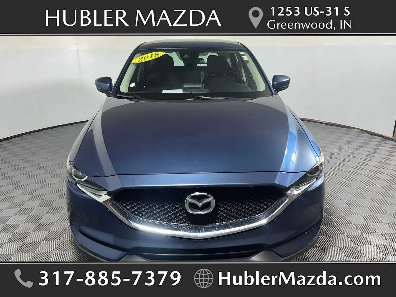 2018 Mazda Mazda CX-5 Sport in Eternal Blue Mica — front three-quarter view