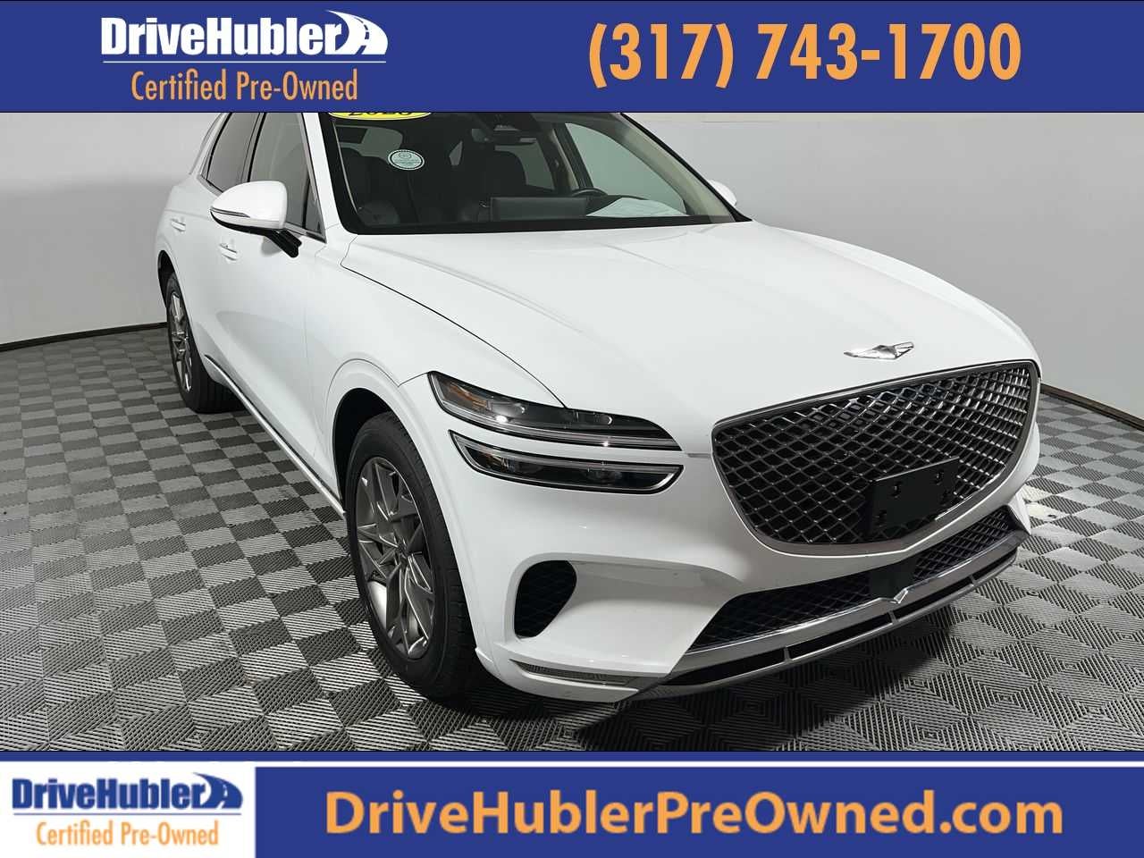 2025 Genesis GV70 2.5T in Alta White — front three-quarter view