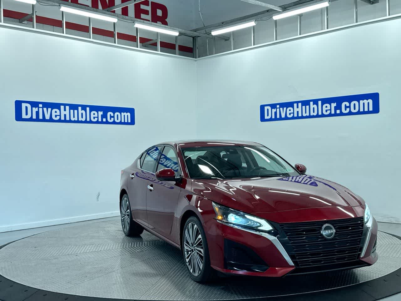 2023 Nissan Altima 2.5 SL in Scarlet Ember Tintcoat — front three-quarter view
