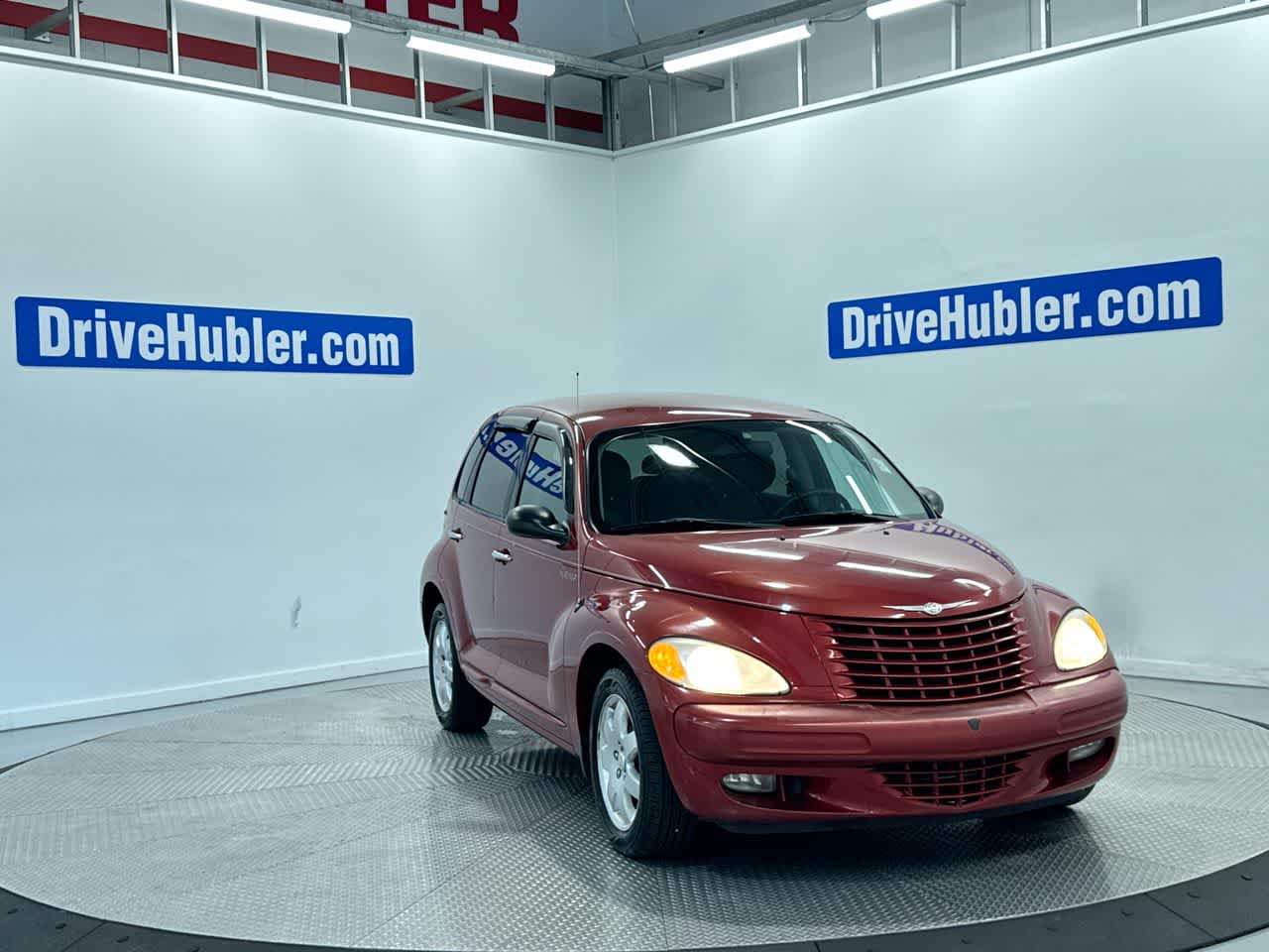 2003 Chrysler PT Cruiser Touring in Inferno Red Tinted Pearl — front three-quarter view