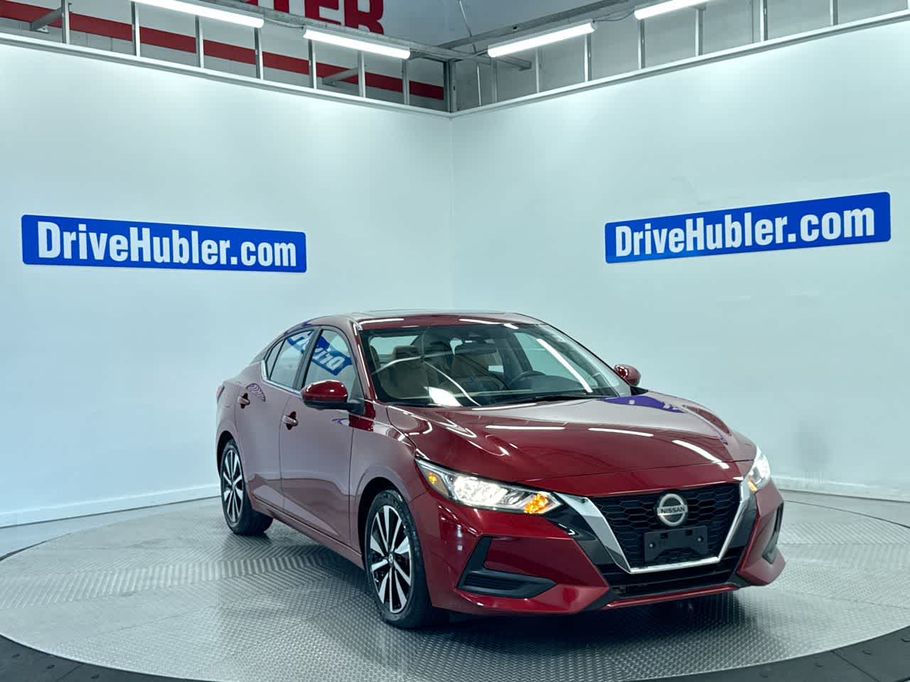 2023 Nissan Sentra SV in Scarlet Ember Tintcoat — front three-quarter view