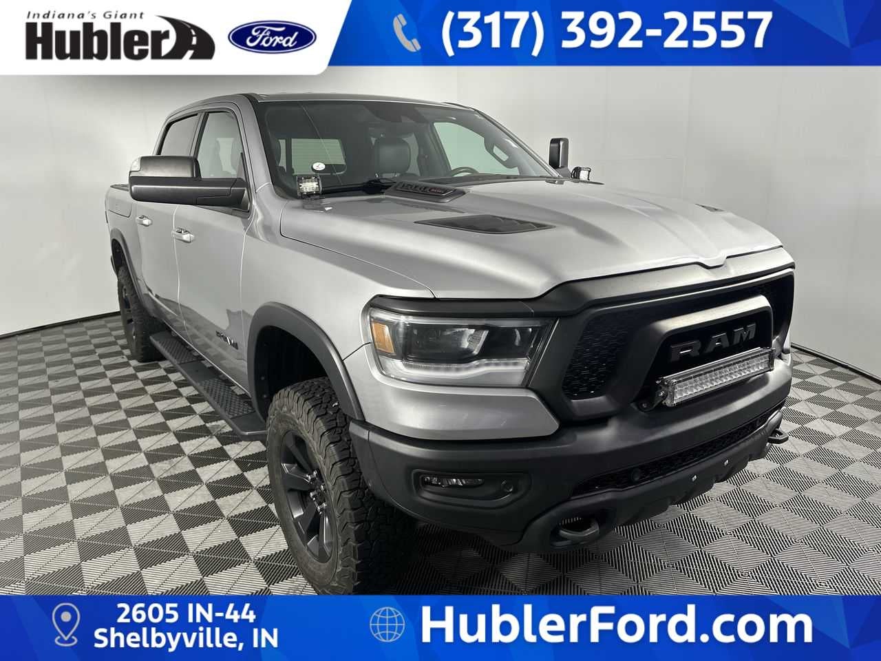 2021 RAM 1500 Rebel in Billet Silver Metallic Clearcoat — front three-quarter view