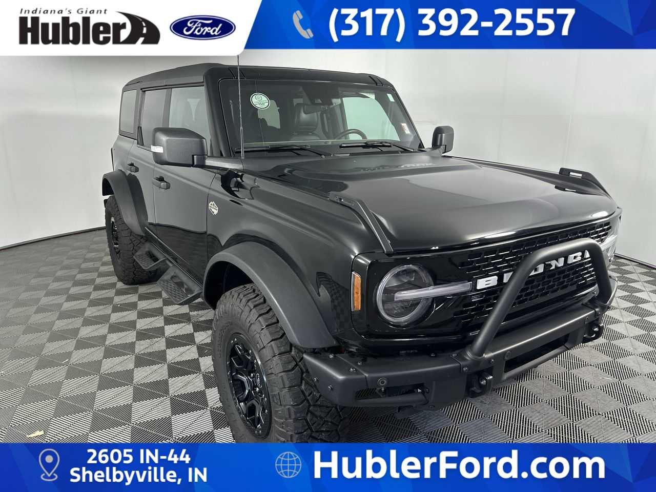 2024 Ford Bronco Wildtrak in Shadow Black — front three-quarter view