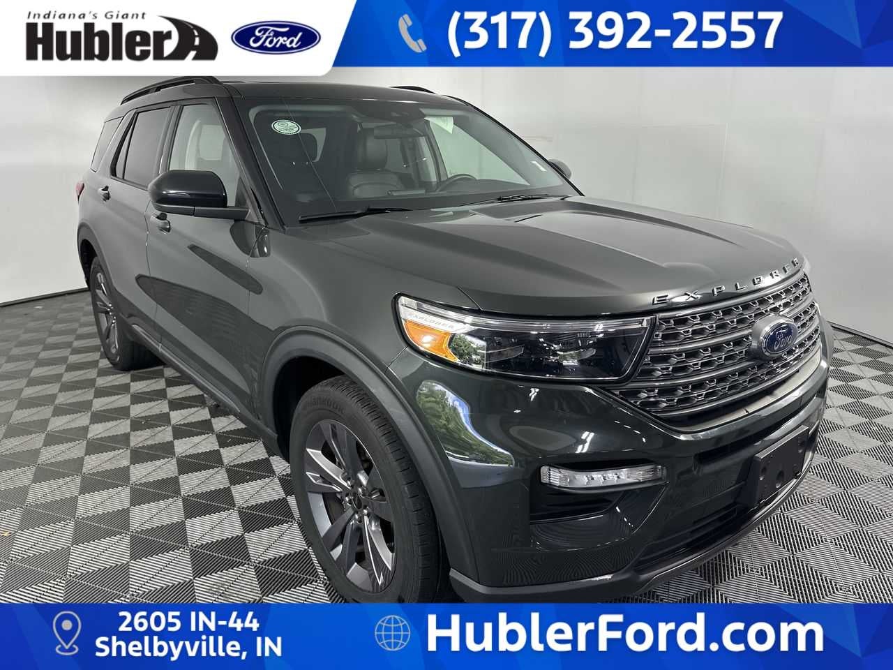 2022 Ford Explorer XLT in Forged Green Metallic — front three-quarter view