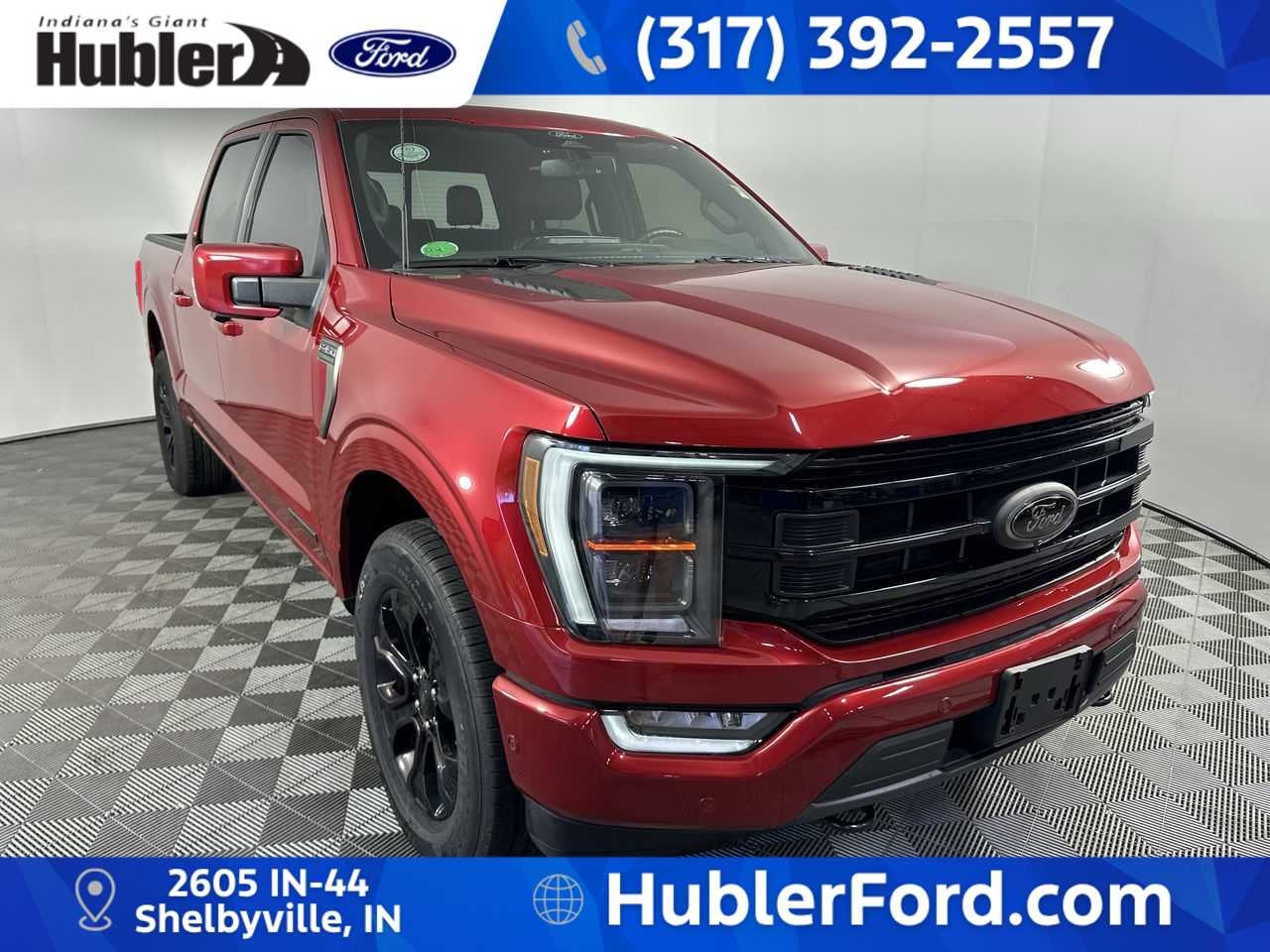 2022 Ford F-150 Platinum in Rapid Red Metallic Tinted Clearcoat — front three-quarter view