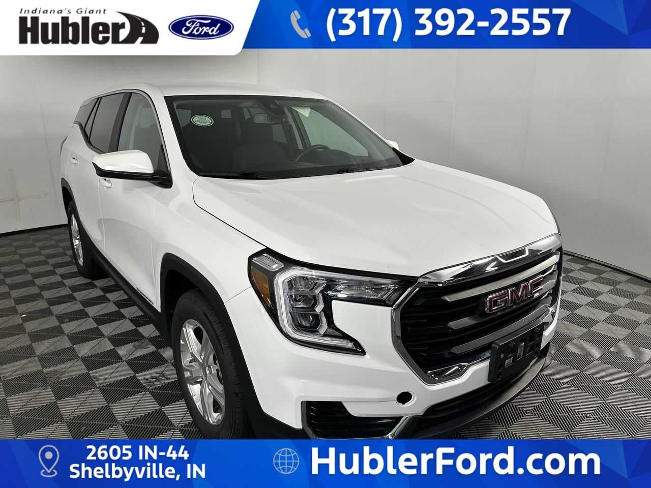 2024 GMC Terrain SLE in Summit White — front three-quarter view
