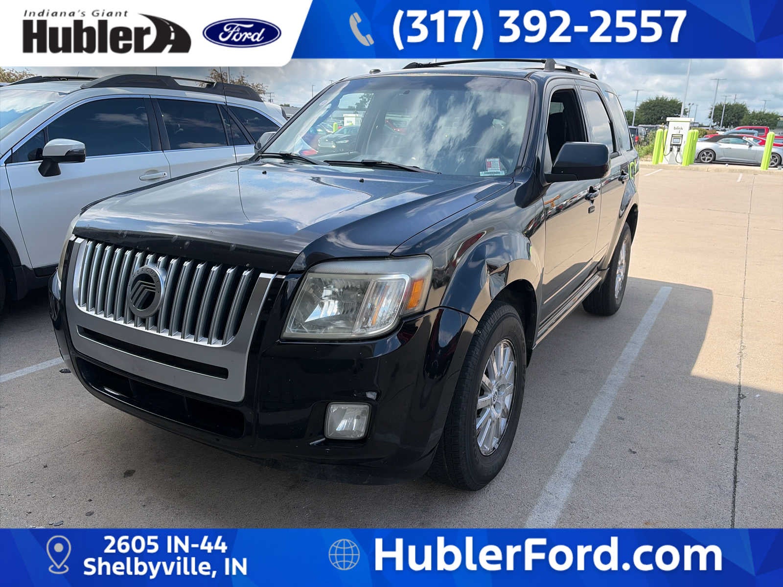 2010 Mercury Mariner Premier in Majestic Black Pearl — front three-quarter view